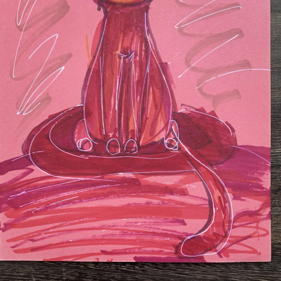 Рисунок на цветной бумаге: котенок